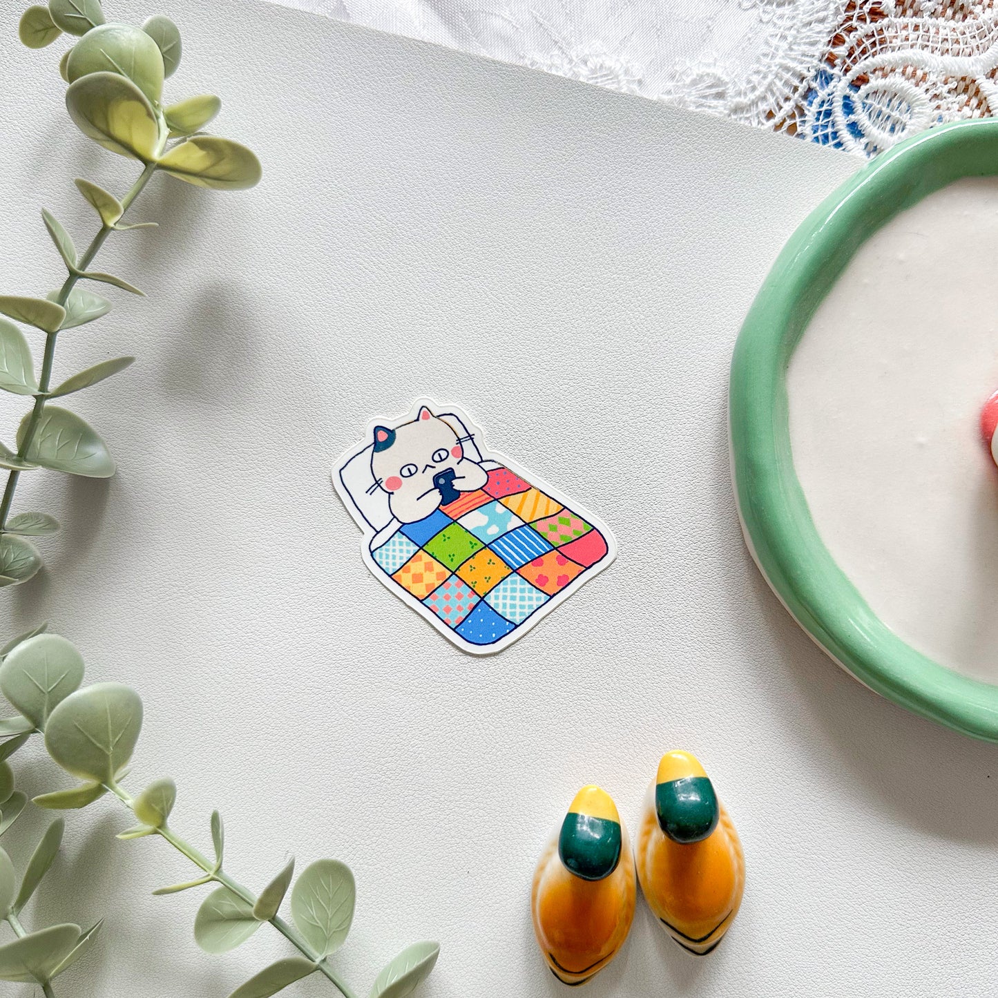 doomscrolling cat sticker